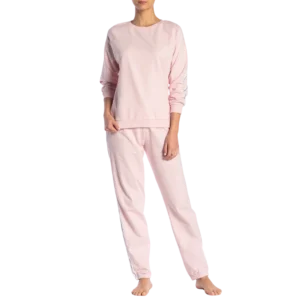 Everything You Need to Know About Sleepwear Manufacturing in Tiruppur 3 a woman wearing pink pajamas