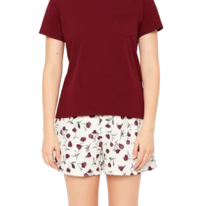 Everything You Need to Know About Sleepwear Manufacturing in Tiruppur 4 a woman wearing a red shirt and white shorts